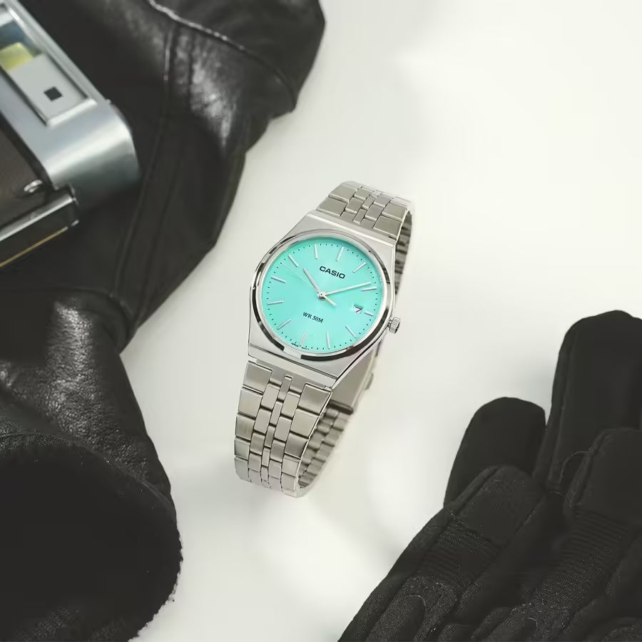 Casio MTP-B145G-9AVEF men's watch featuring a trendy Tifny blue analog dial and luxurious gold stainless steel link bracelet