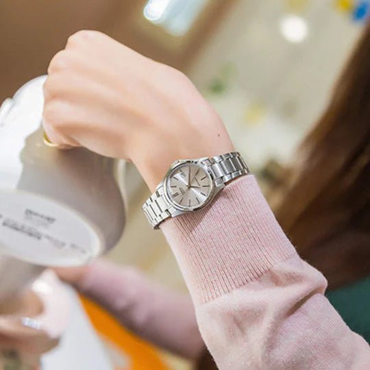 Casio LTP-1183A-7ADF quartz womens dress watch featuring a silver dial with date display and polished stainless link bracelet