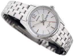 LTP-1335D-7AVDF Casio White Dial Day Date Stainless Steel Analog Quartz Women's Watch. - Timecheck