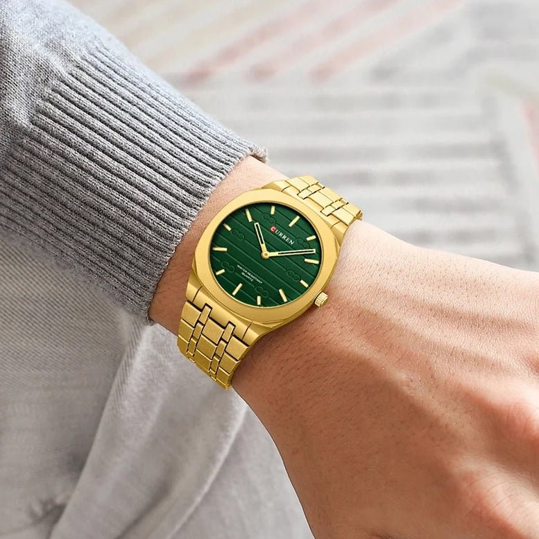 Curren M-8444 men's watch featuring a striking green analog dial and luxurious gold stainless steel link bracelet
