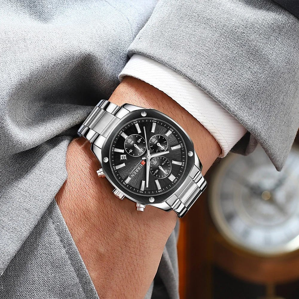 Curren M8440 mens chronograph analog watch featuring a bold black dial face and polished silver stainless steel link bracelet