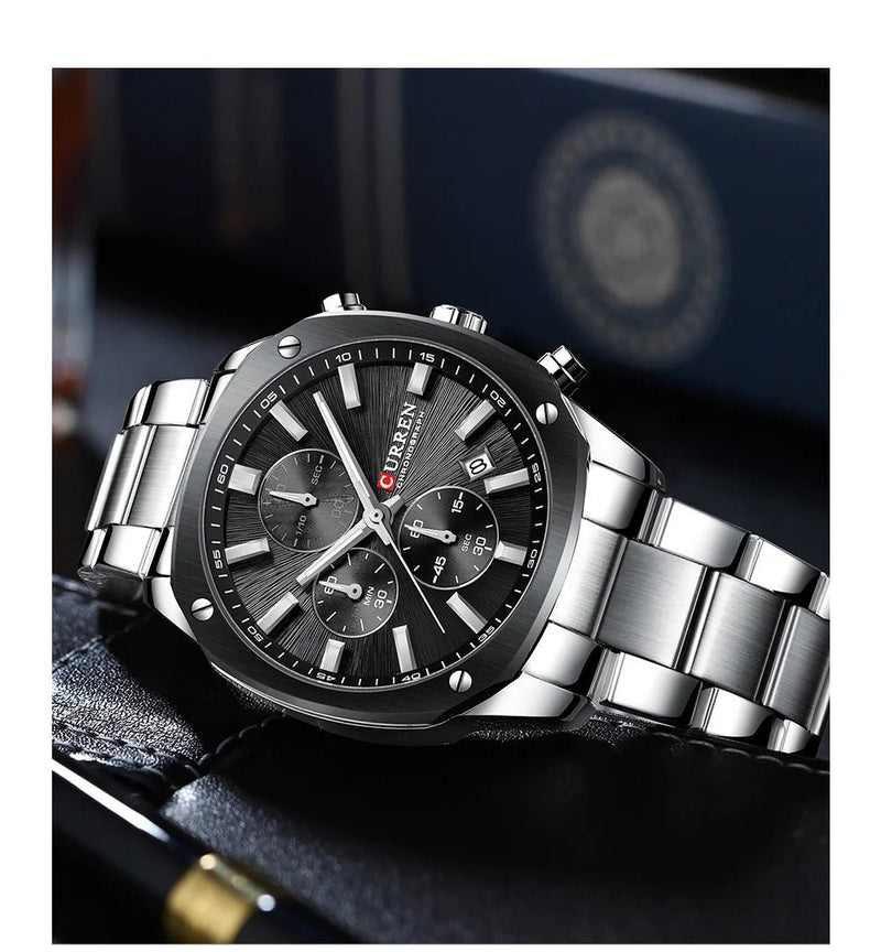 Curren M8440 mens chronograph analog watch featuring a bold black dial face and polished silver stainless steel link bracelet