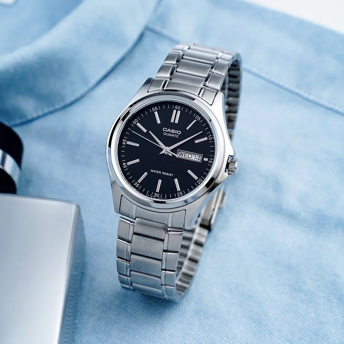 Casio MTP-1239D-1ADF men's watch featuring a sleek black analog dial and durable silver stainless steel bracelet