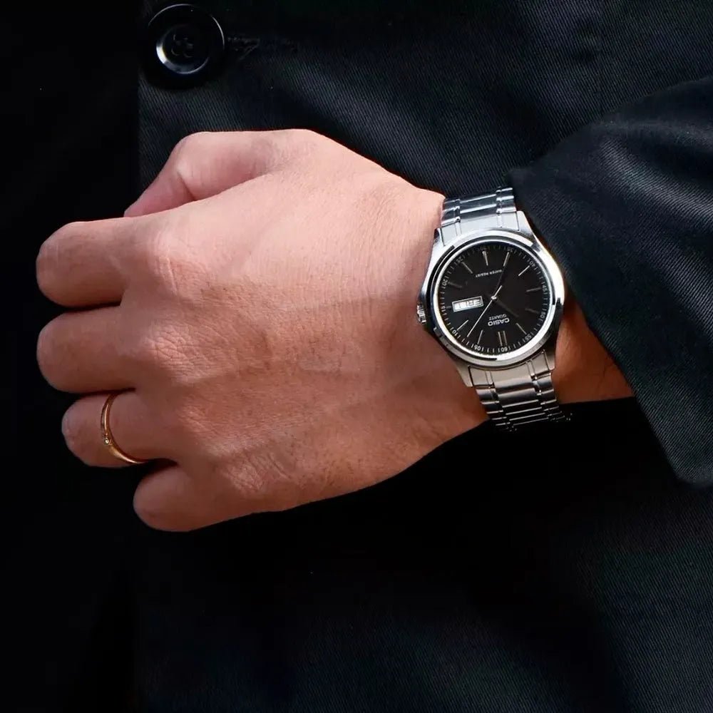 Casio MTP-1239D-1ADF men's watch featuring a sleek black analog dial and durable silver stainless steel bracelet