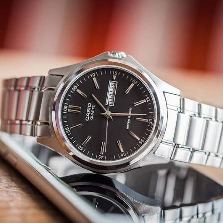 Casio MTP-1239D-1ADF men's watch featuring a sleek black analog dial and durable silver stainless steel bracelet