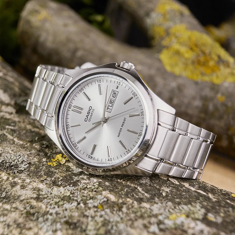 Casio MTP-1239D-7ADF men's analog watch featuring a clean silver dial face and polished silver stainless steel link bracelet