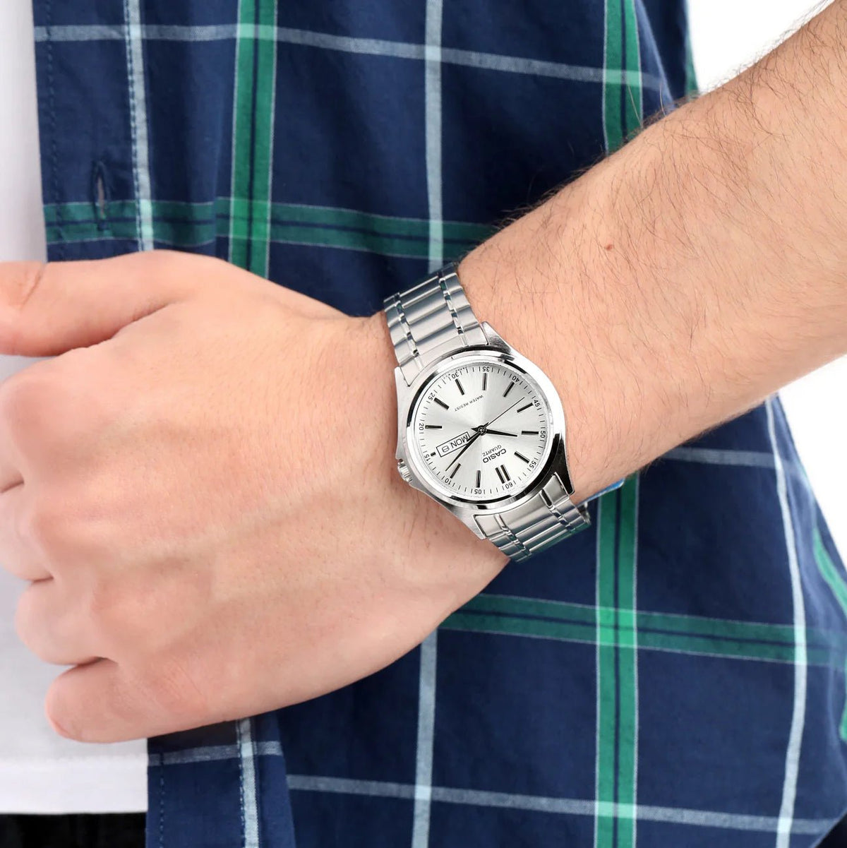 Casio MTP-1239D-7ADF men's analog watch featuring a clean silver dial face and polished silver stainless steel link bracelet