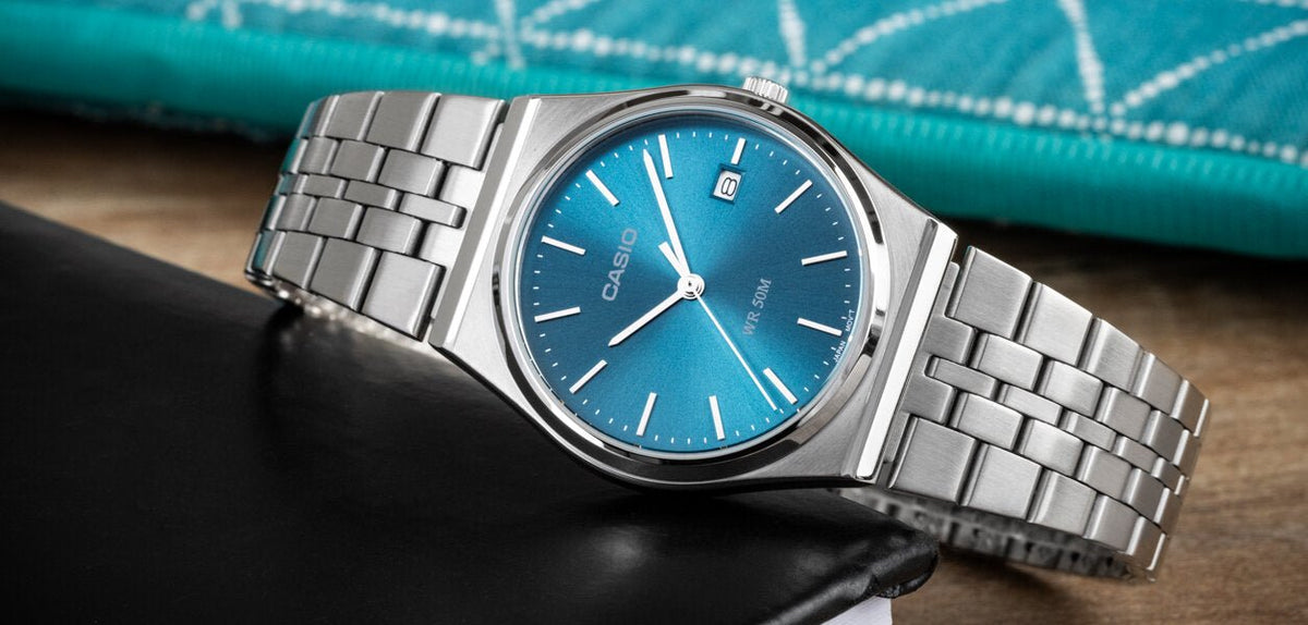 Casio MTP-B145D-2A2VEF men's watch featuring a classic blue analog dial and sleek silver stainless steel link bracelet