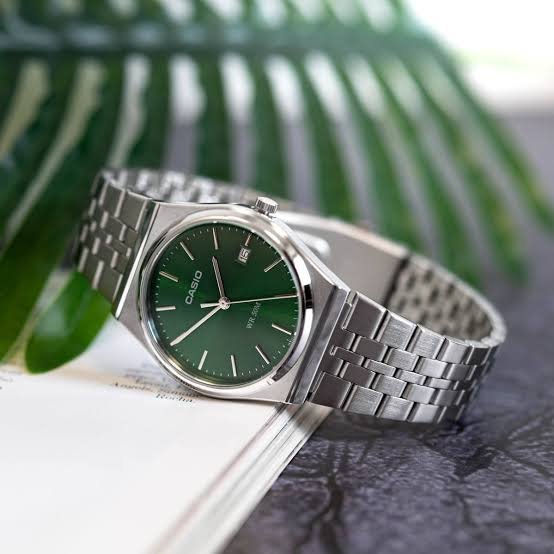 Casio MTP-B145D-3AVDF men's watch featuring a striking green analog dial and elegant silver stainless steel link bracelet