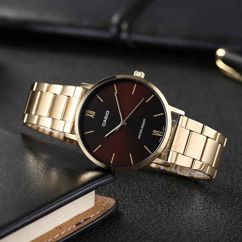 Casio MTP-VT01G-5BUDF men's watch featuring a rich brown analog dial and polished stainless steel bracelet