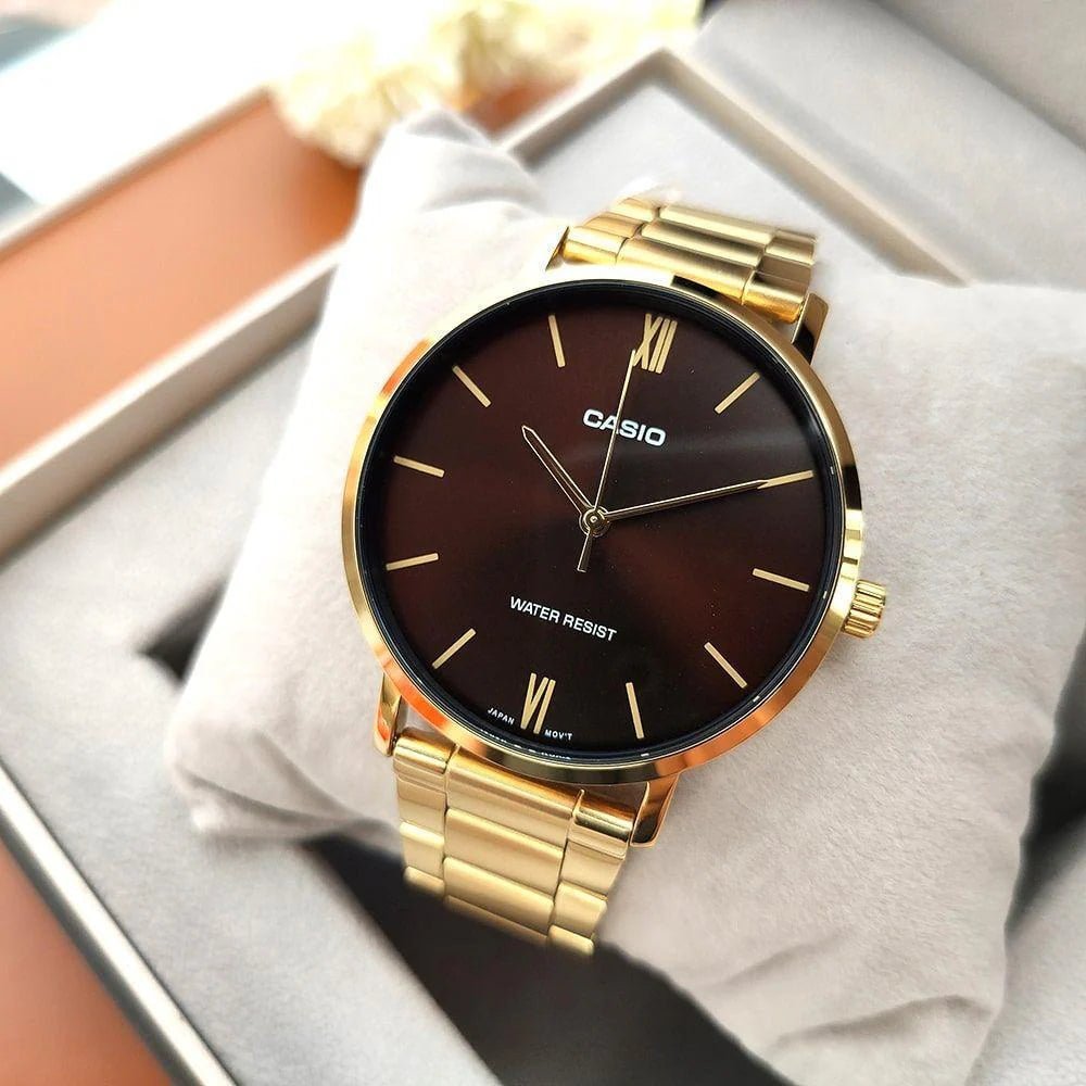 Casio MTP-VT01G-5BUDF men's watch featuring a rich brown analog dial and polished stainless steel bracelet